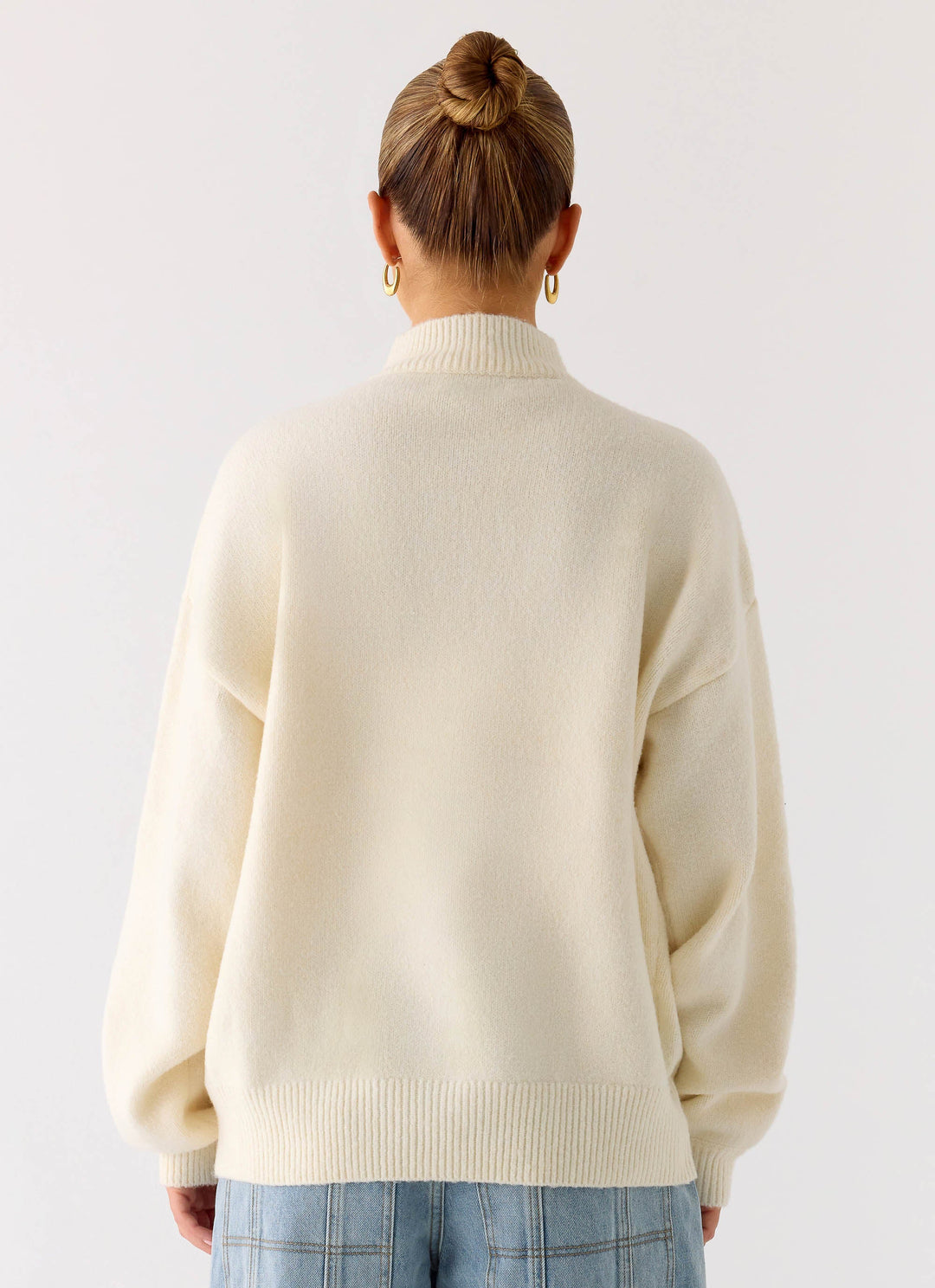 Women's ivory knit zip jacket with mock neck and long sleeves