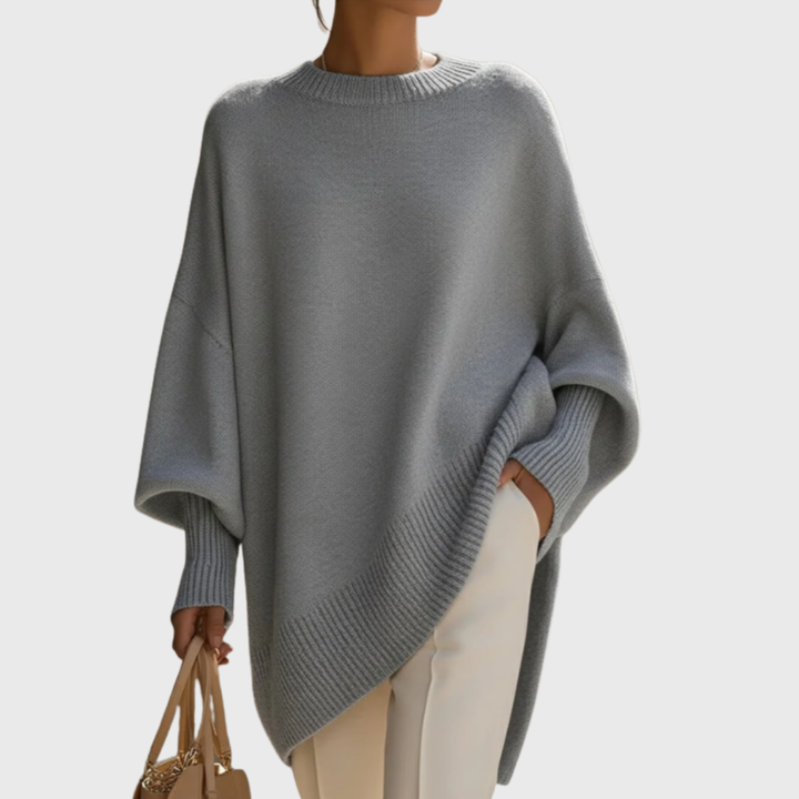 Women's oversized poncho sweater with crew neck and batwing sleeves