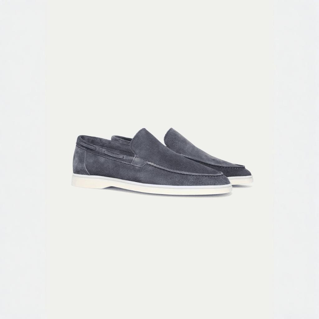 Men's grey slip-on loafers with moc toe and flat light-coloured soles