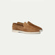 Men's brown slip-on loafers with moc toe stitching and white soles