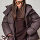 Women's hooded quilted puffer winter coat with zip front and long sleeves