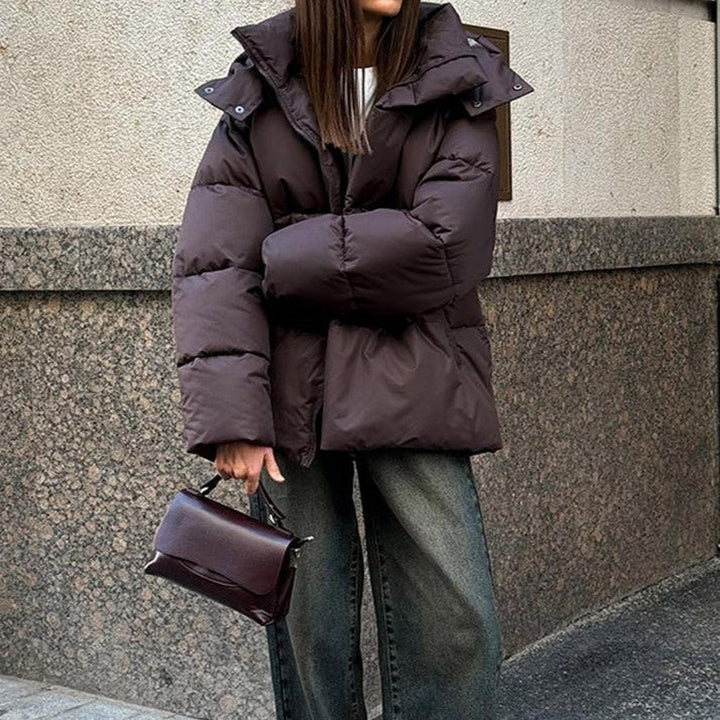 Women's hooded quilted puffer winter coat with zip front and long sleeves