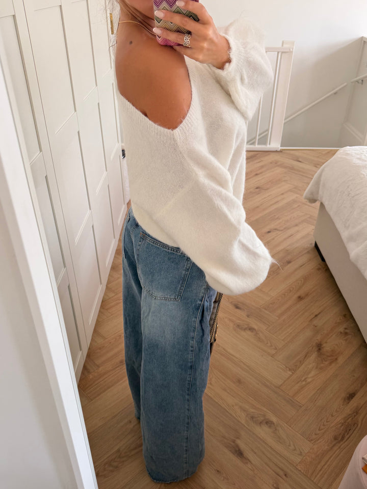 Women's white off-shoulder sweater with long sleeves and ribbed trims
