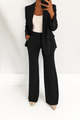 Women's two-piece trouser suit with notch lapel blazer and wide-leg trousers