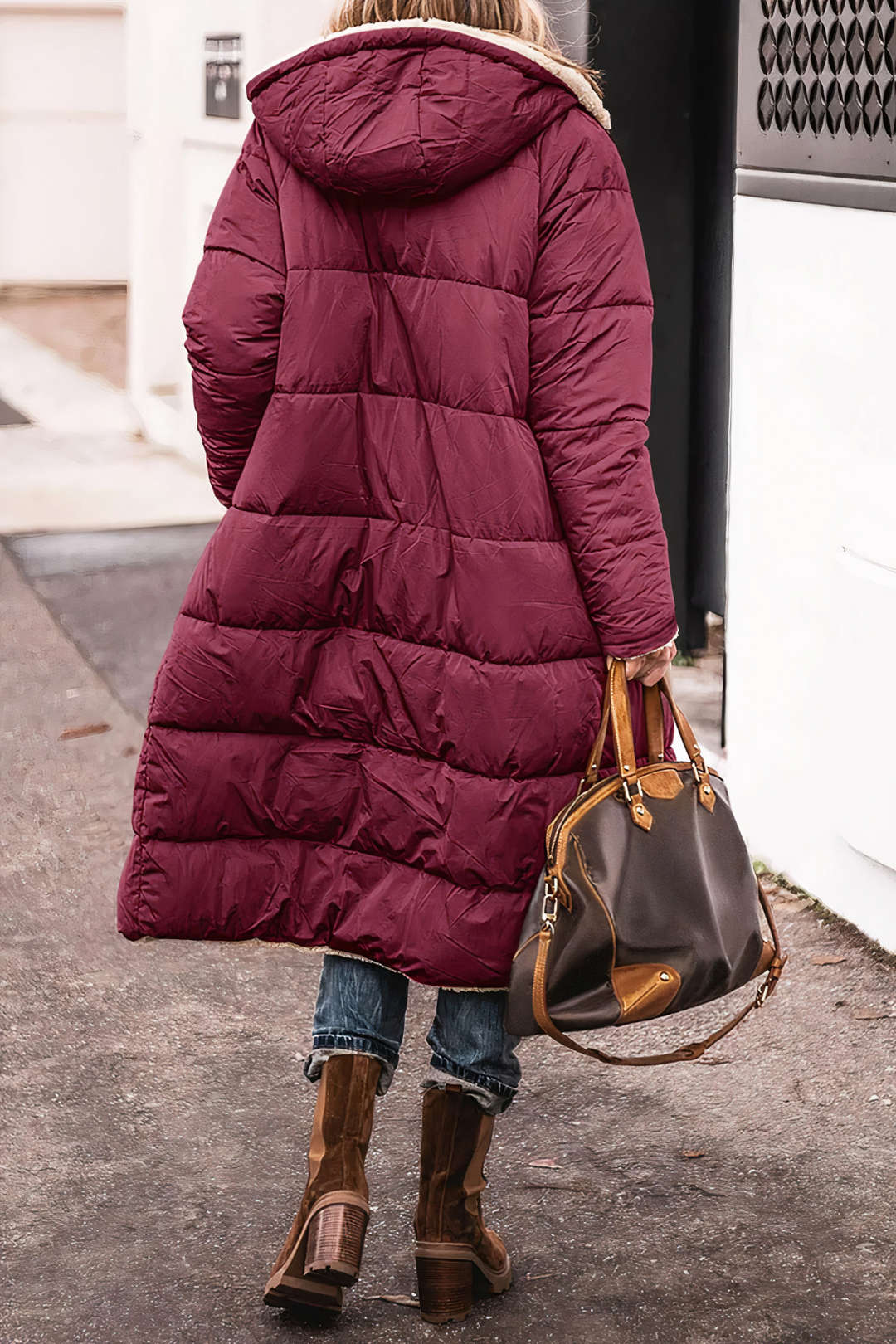 Women's long quilted hooded coat with plush trim