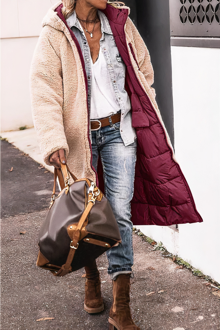 Women's long quilted hooded coat with plush trim