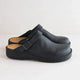 Women's leather clog mules with adjustable buckle strap and lugged sole