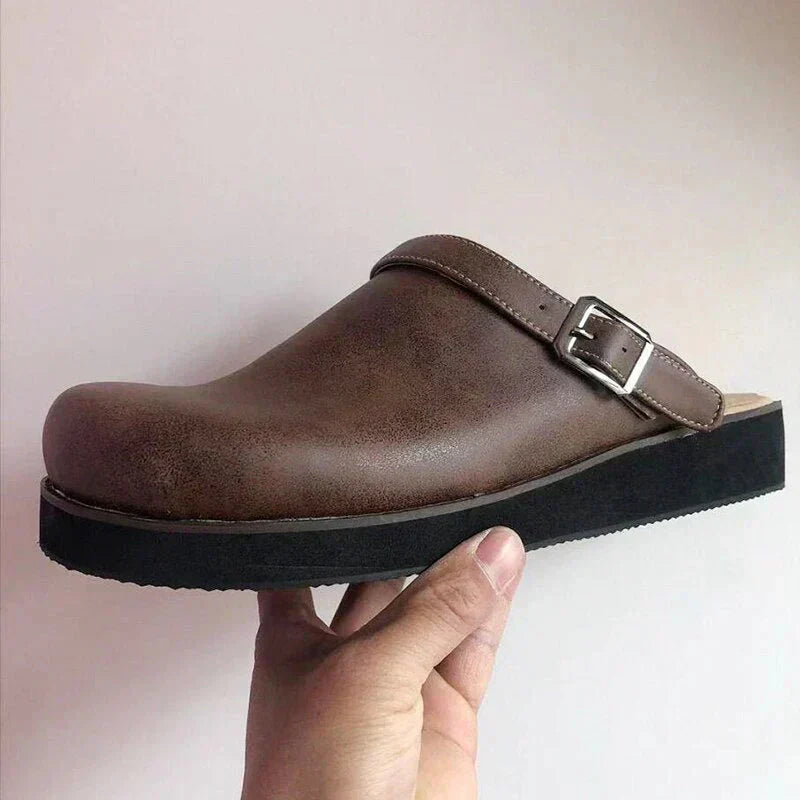 Women's leather clog mules with adjustable buckle strap and lugged sole
