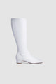 White women's knee-high boots with square toes and low block heels
