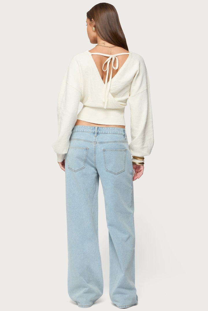 Women's wrap sweater with V-neckline and cropped ribbed hem
