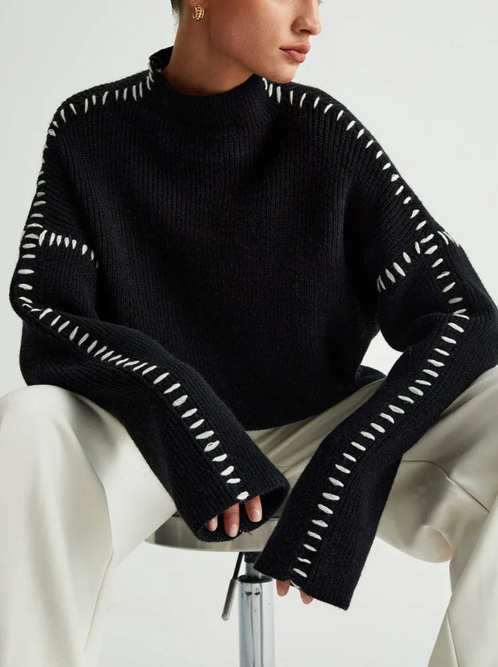 Women's textured knit sweater with crew neck and contrast stitching