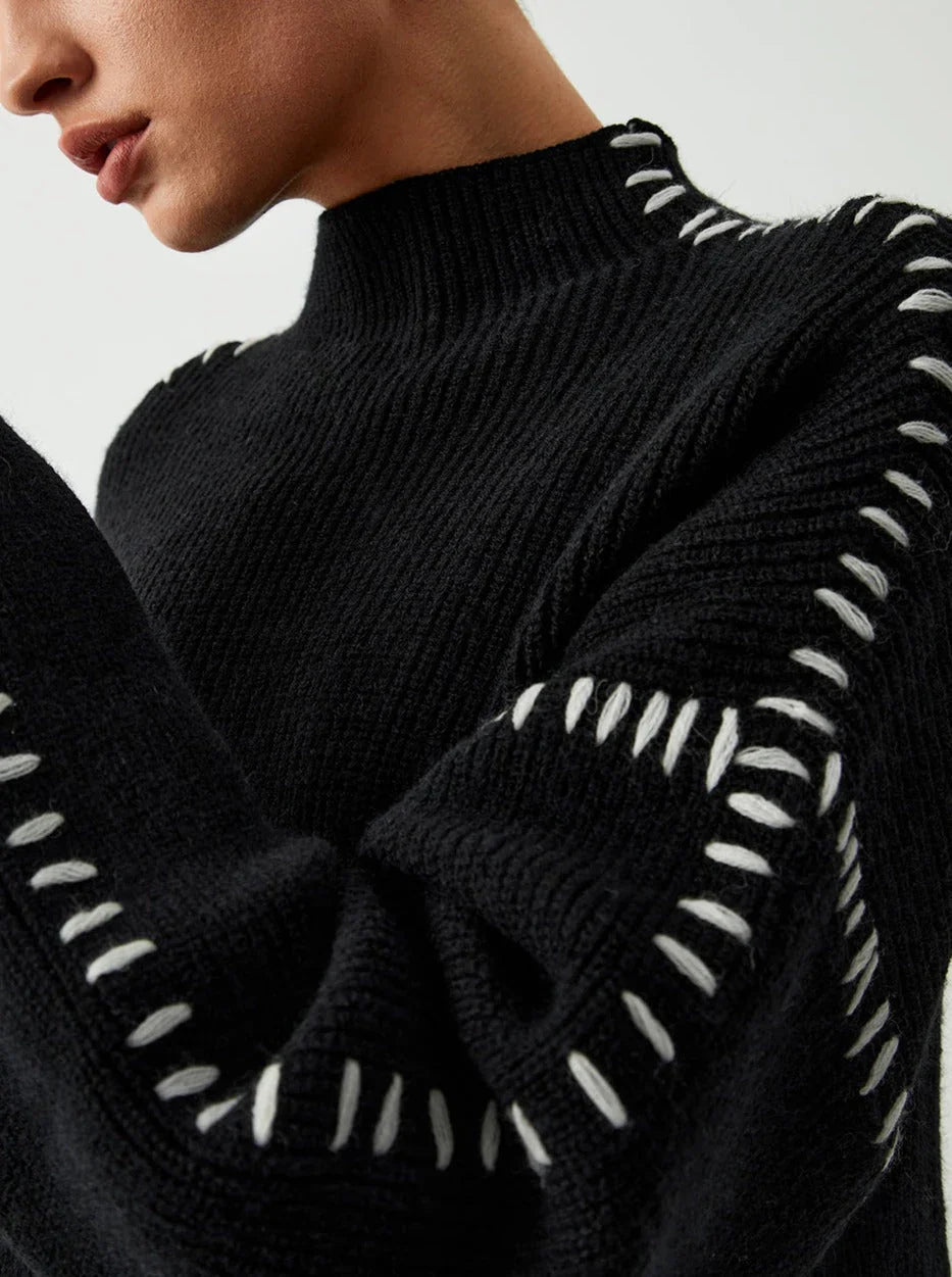 Women's textured knit sweater with crew neck and contrast stitching