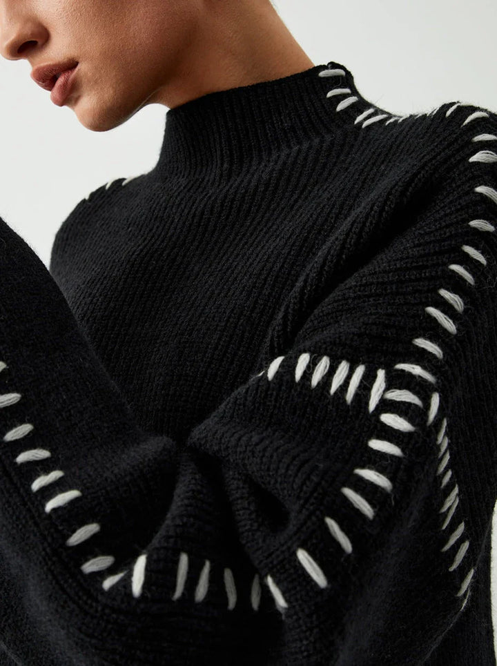 Women's textured knit sweater with crew neck and contrast stitching