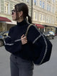 Women's textured knit sweater with crew neck and contrast stitching