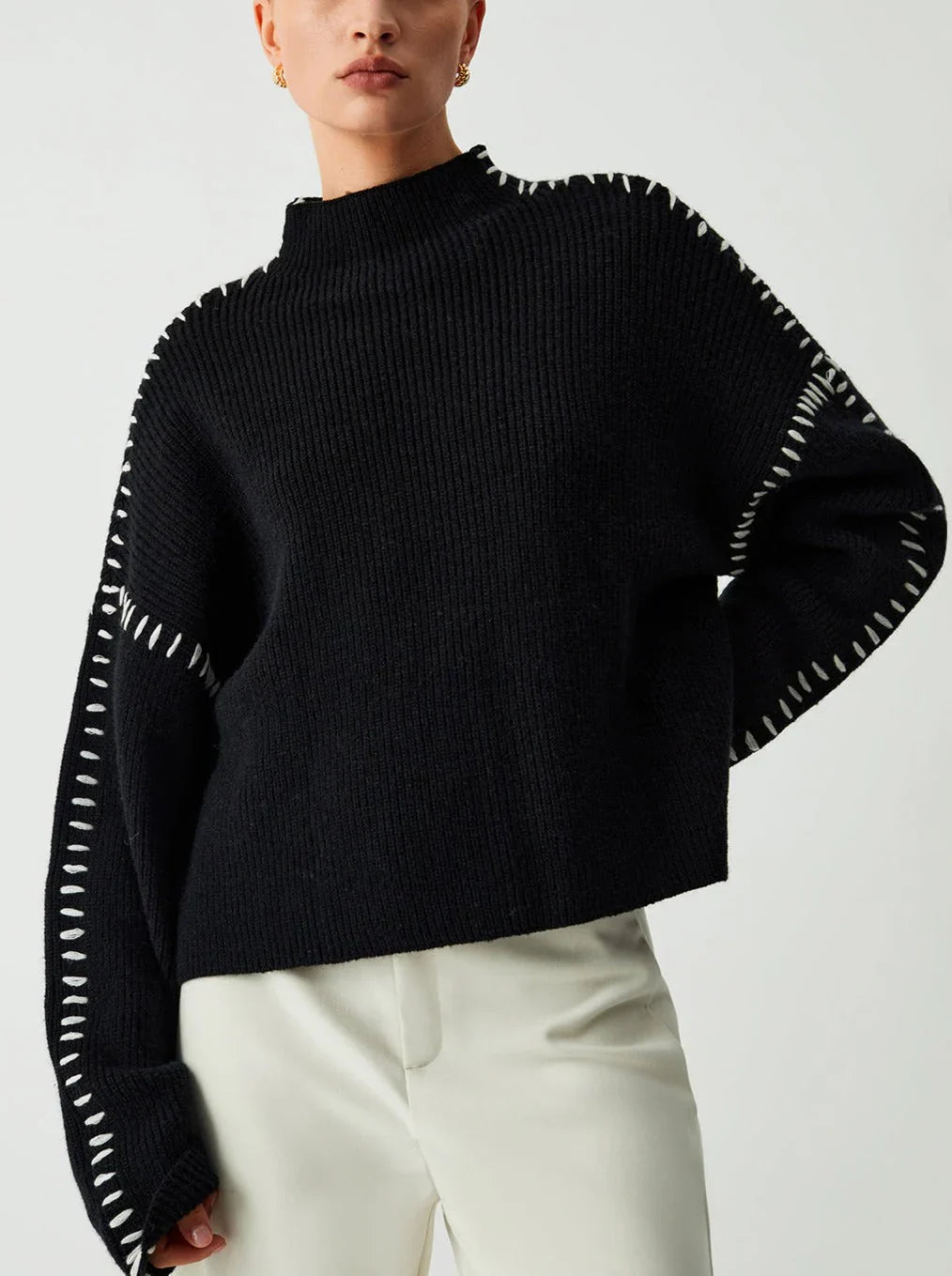 Women's textured knit sweater with crew neck and contrast stitching