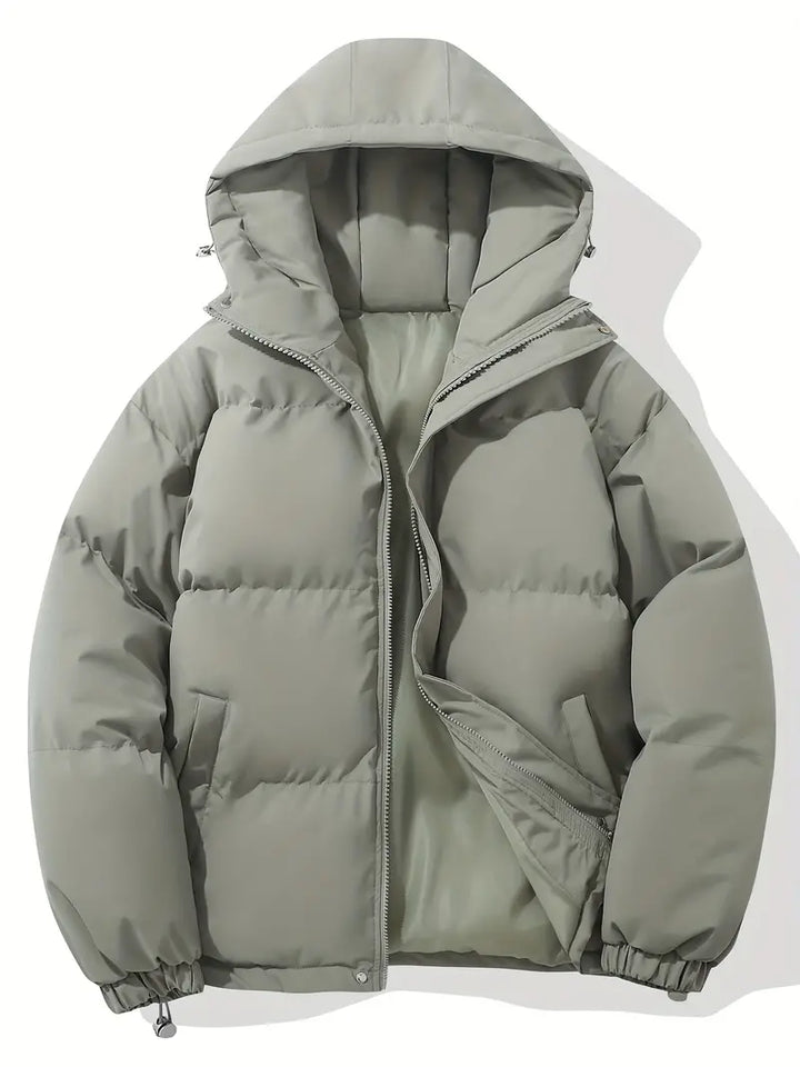 Women's hooded quilted puffer jacket with zip front and adjustable hem
