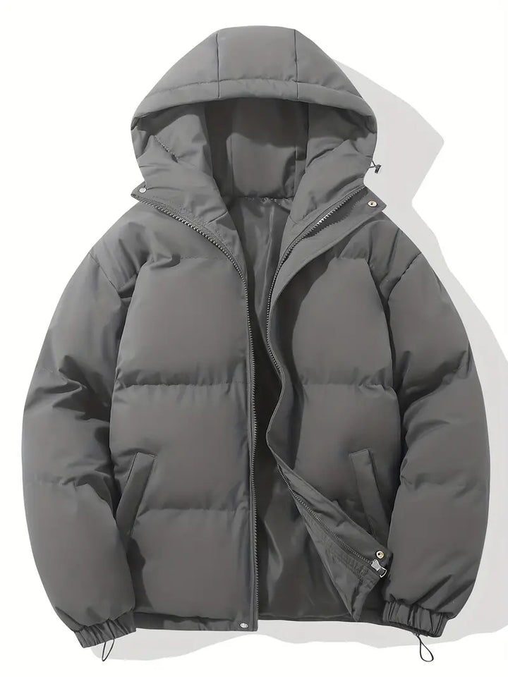 Women's hooded quilted puffer jacket with zip front and adjustable hem