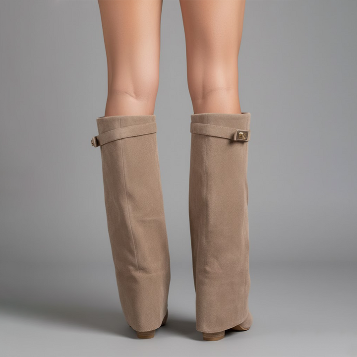 Women's black faux leather over-the-knee boots with buckle detail