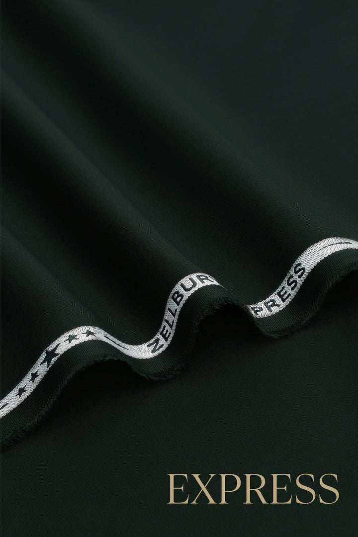 Close-up of solid wash and wear suit fabric with blue branded trim
