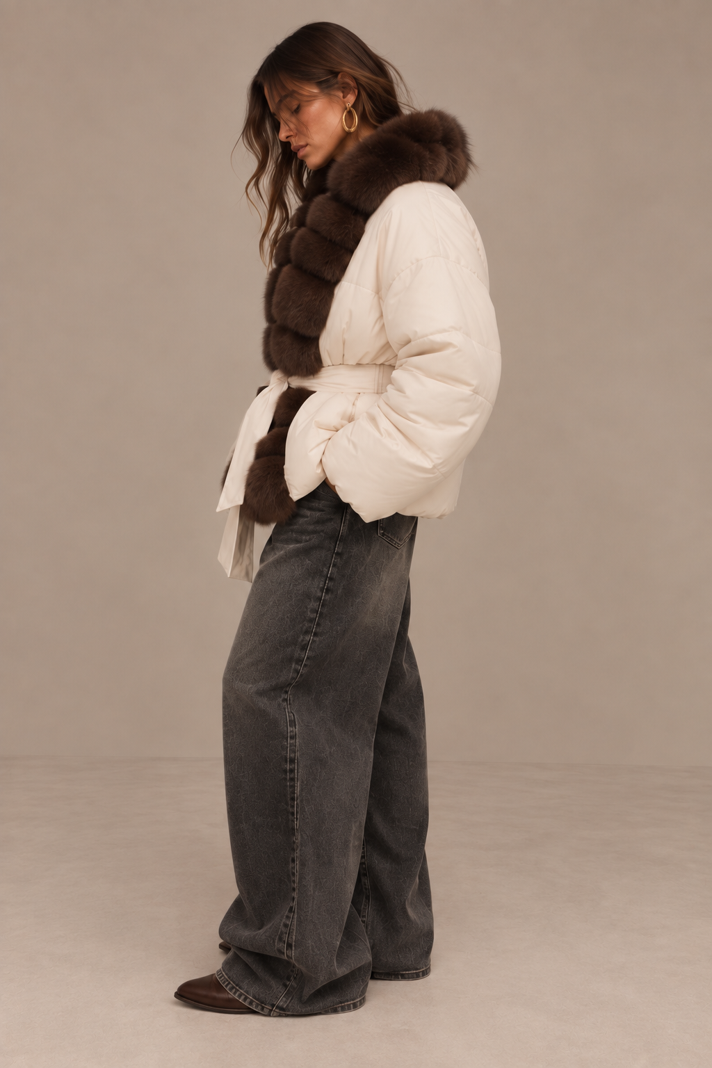 Women's puffer jacket with textured brown trim and front waist tie