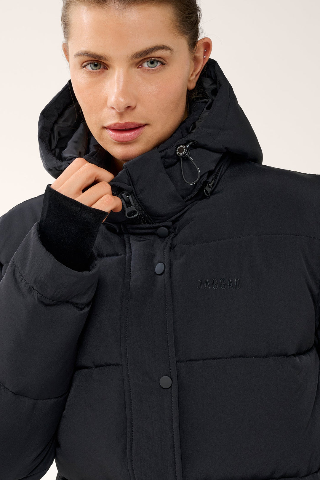 Black women's quilted hooded puffer jacket with long sleeves