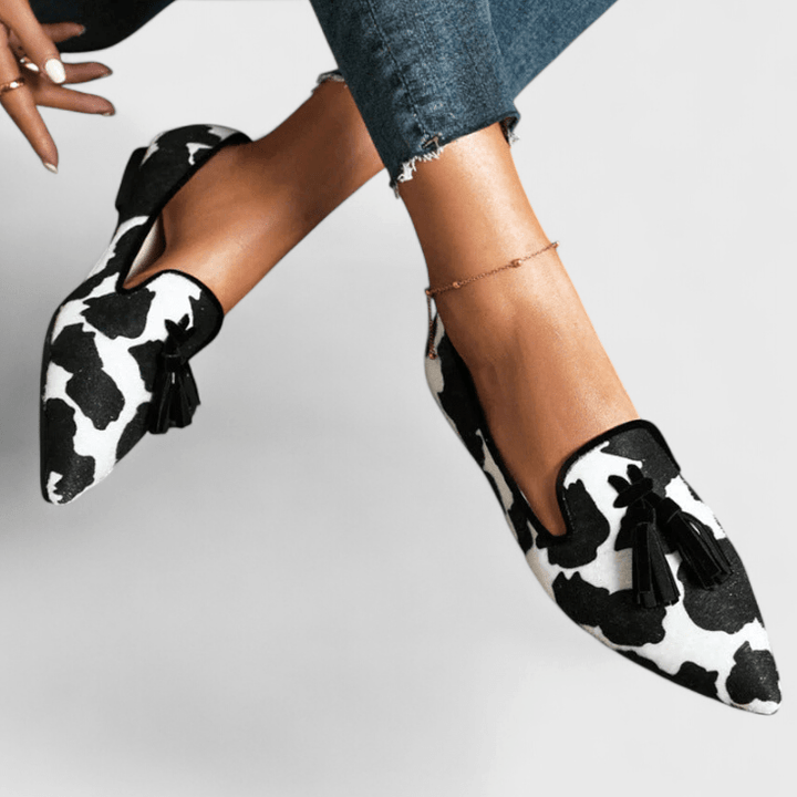 Women's pointed animal pattern loafers with tassels
