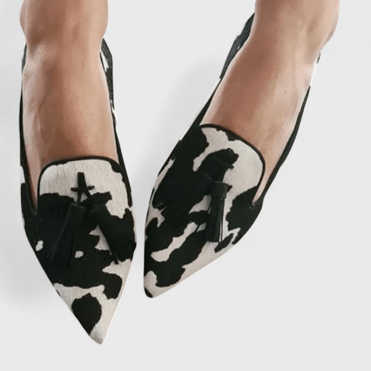Women's pointed animal pattern loafers with tassels