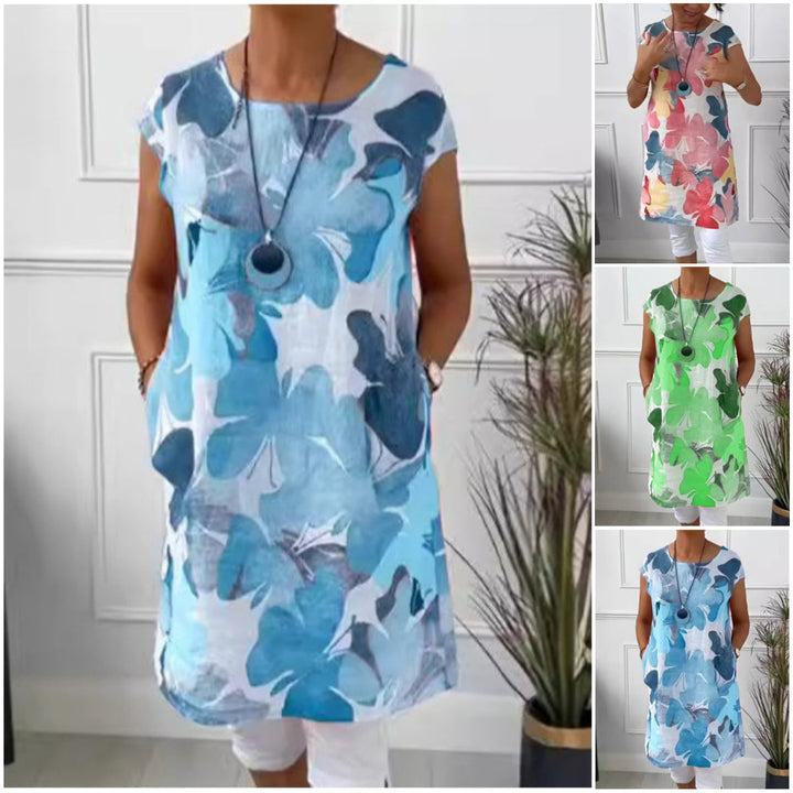 Women's floral print shift dress with short sleeves, crew neck and mid-calf hem