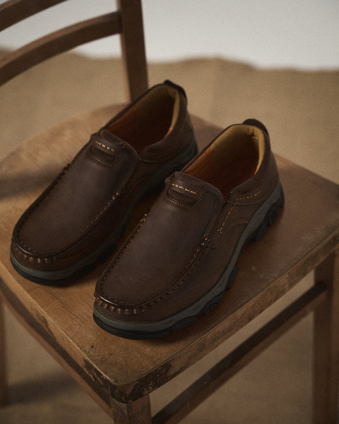 Unisex brown moc toe loafers with chunky soles