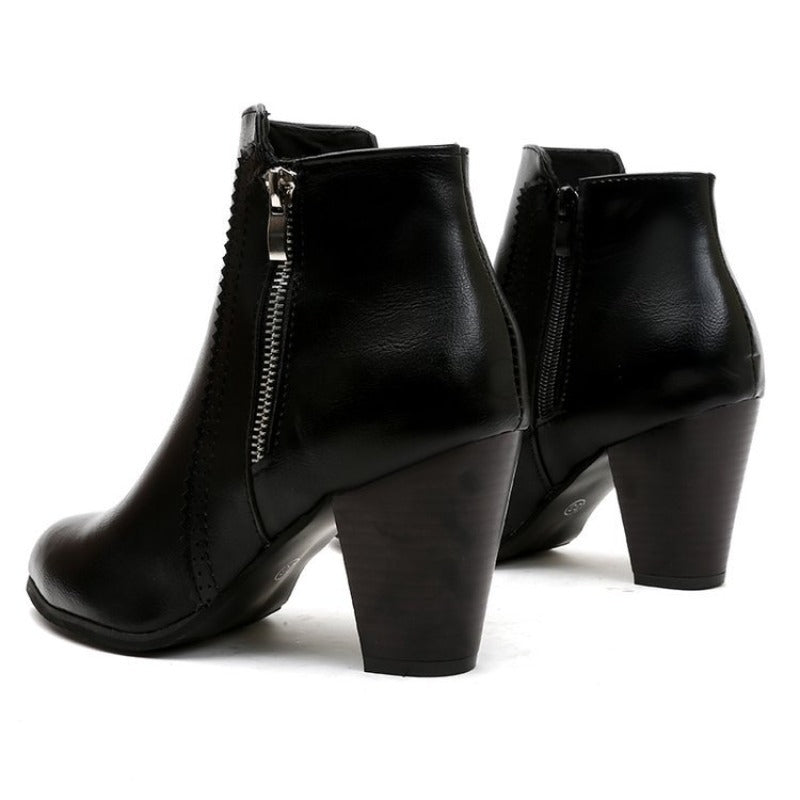Women's heeled ankle boots with pointed toe, side zipper and high block heel