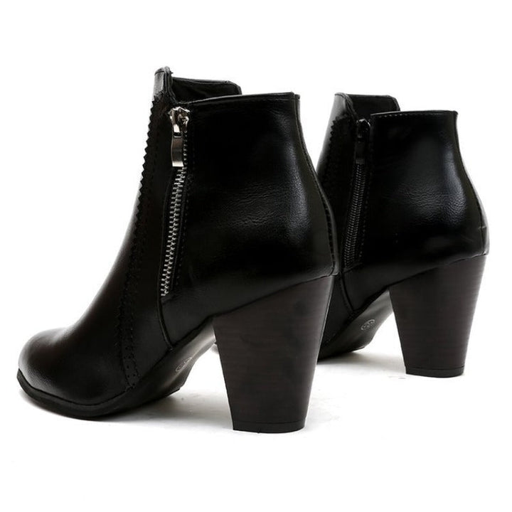 Women's heeled ankle boots with pointed toe, side zipper and high block heel