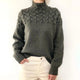 Women's cable knit turtleneck sweater with long sleeves and ribbed trims