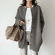 Women's long button front cardigan with round neck and long sleeves