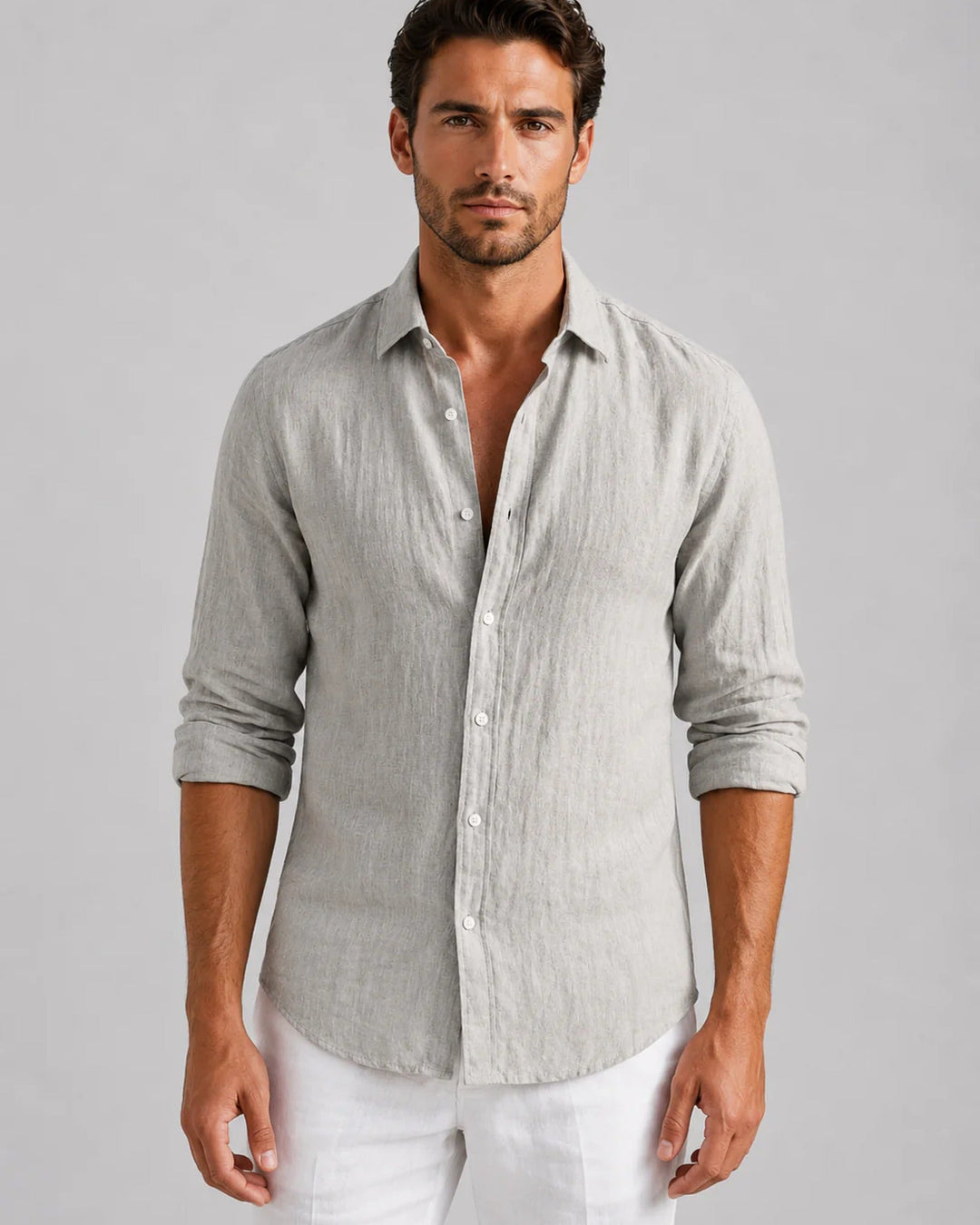 Men's long sleeve button-front shirt with pointed collar and curved hem