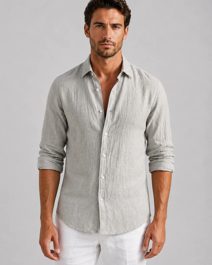 Men's long sleeve button-front shirt with pointed collar and curved hem