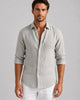 Men's long sleeve button-front shirt with pointed collar and curved hem