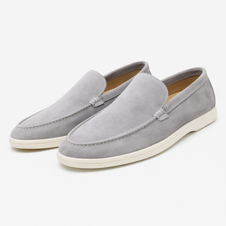 Unisex slip-on loafers with moc toe stitching and flat sole