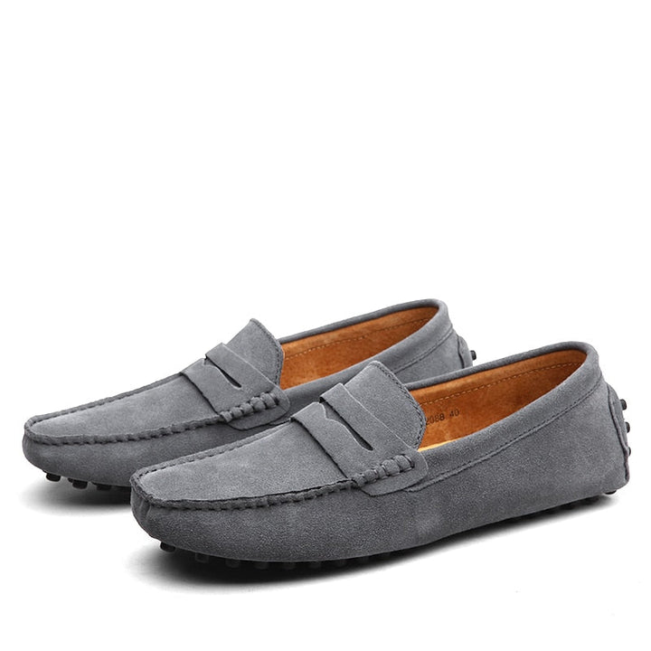 Men's moc toe loafers with penny strap detail and flat sole