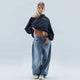 Women's pullover hoodie with hood, long sleeves, ribbed trims and contrast front graphic