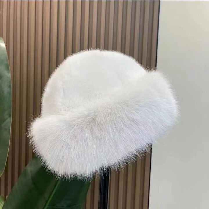 Women's fluffy fur-textured winter hat with rounded crown and wide brim