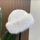 Women's fluffy fur-textured winter hat with rounded crown and wide brim