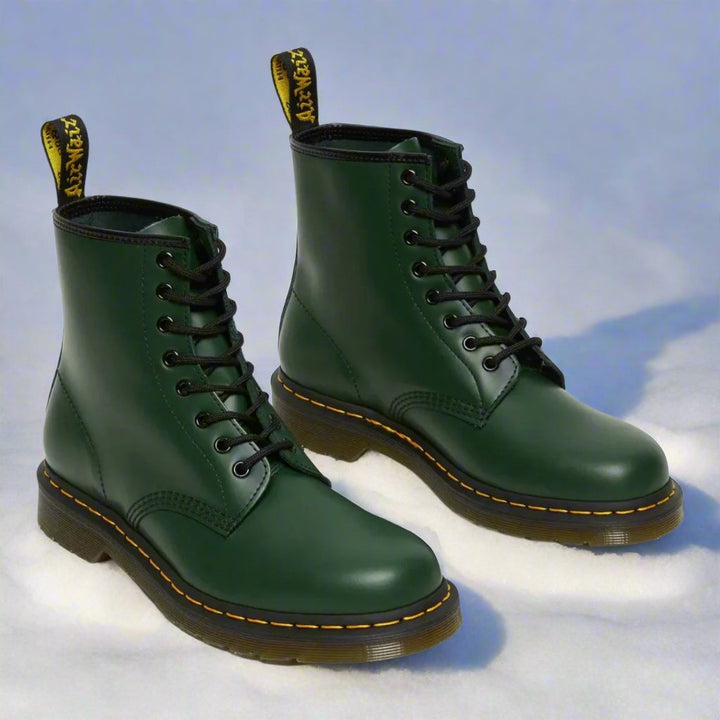Men's ankle-height combat boot with black laces, round toe and lug sole