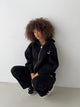 Black women's zip-up hoodie with hood, front pockets and pink chest logo