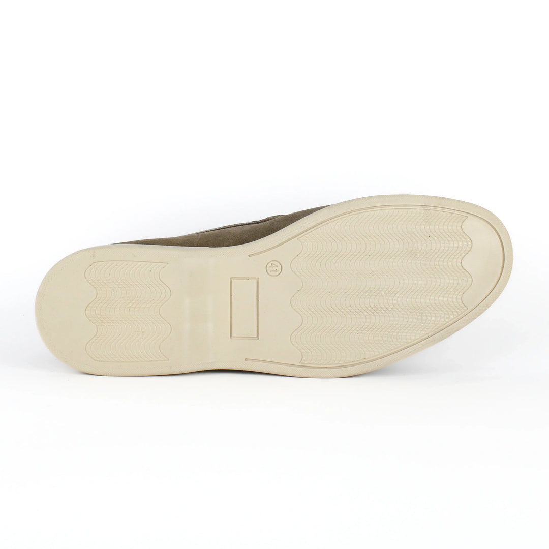 Beige moccasin loafers with rounded toes, stitched detailing and low soles