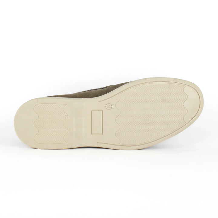 Beige moccasin loafers with rounded toes, stitched detailing and low soles