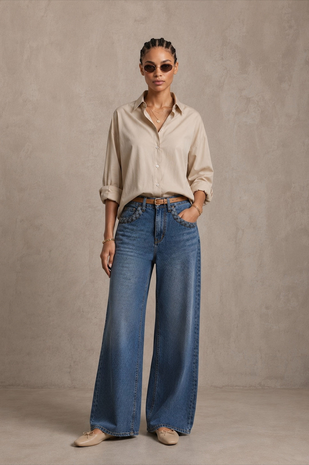 Women's blue wide leg jeans with high-rise waist and braided pocket trim