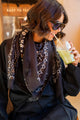 Black abstract pattern bandana scarf with fringed edges