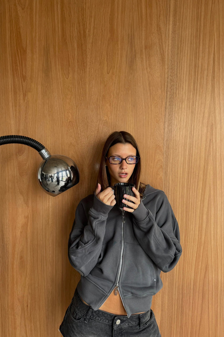 Unisex dark graphic zip-up hoodie with hood and ribbed cuffs