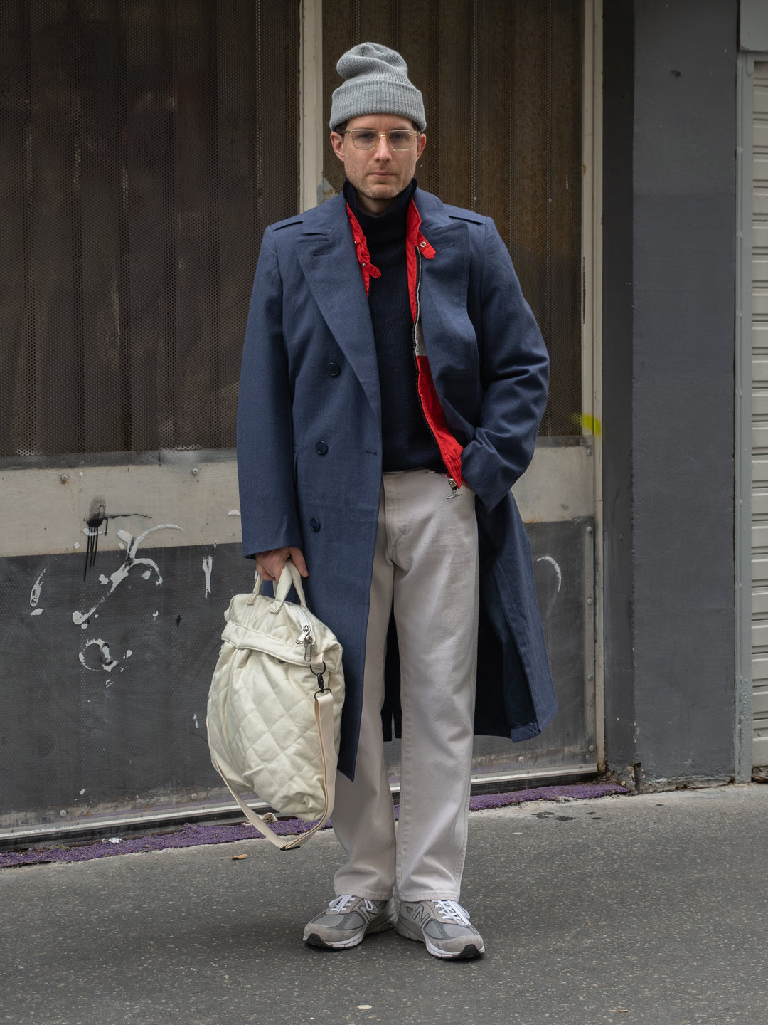 Men's navy double-breasted long overcoat with notched lapels