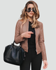 Women's cropped jacket with stand collar, long sleeves, front zipper and zipped pockets
